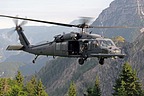 The 56th RQS HH-60G approaching to landing point, in the background the Alpine mountains