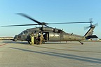 The new flight crew carry out all pre-flight checks for next mission, with the rotors still turning