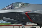 Close-up of the F-35 15-5200 front section with 421st FS "Black Widows" patch, 421st FS Commander Lt. Col. Richard Orzechowski and instruction and warning inscriptions. 