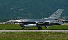 F-16CM 89-2068 of the 555th Fighter Squadron "Triple Nickel" taxiing toward the "Nickel loop", while a F-35A just landed. 