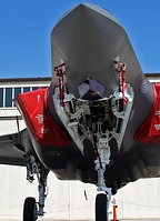 Close-up of the Electro-Optical Targeting System (EOTS) sapphire window and look into the front nose gear well. 
