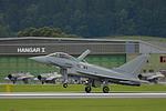 7L-WA touches Austrian ground for the first time, rolling past the demilitarized Saab J-35OE Drakens it will replace.