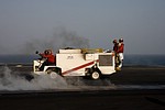 Firefighters driving off after all aircraft launched