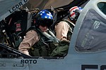 VAQ-140 'Patriots' crew strapping in