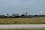 F-4E deploying its brake chute to slow the heavy jet down