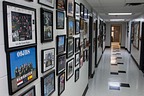 The hallway is covered with class pictures