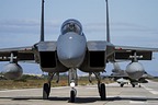 RSAF F-15C Eagle 210 with in the background a two-seat F-16D Block 52+