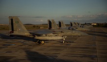RSAF F-15 line-up in the evening light after a thunderstorm had passed the island