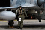 331 Mira pilot doing a post-flight walk-around check of the aircraft