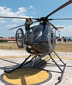 An flight instructor performing TH-500 pre-flight checks