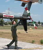 An flight instructor performing TH-500 pre-flight checks