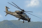 An AH-129D Mangusta flies over the action area to protect the soldiers operating on the ground