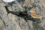 AH-129D Mangusta flies over the action area
