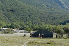 Elements of the 66° Reggimento Fanteria Aeromobile perform the extraction of the pilots, while the A-129D scouts the surroundings for any hostiles