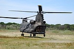 CH-47C Chinook departing the LZ having dropped off the troops