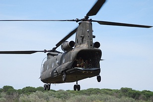 CH-47C Chinook with the loadmaster and gunner on the rear-ramp