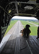 A view of the runway at Rimini Miramare over the shoulder of the CH-47C ramp gunner