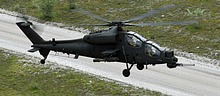 AH-129C provides cover and can counter any threats while the UH-90A is on the ground
