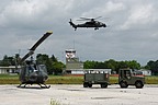 AH-129C seen coming in to land, in the foreground the UH-205 of 27° Gr. Sq. “MERCURIO”