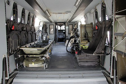 View inside the NH90 TTH Cabin from the rear ramp, note the PTS, folding seats, and M249 Minimi