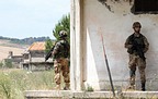 Italian soldiers guarding the building at the Monte Romano range