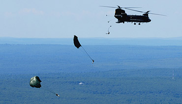 Paratroopers jumping from the CH-47 Chinook