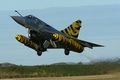 Arme de l'Air Mirage 2000C with tiger tail and auxiliary fuel tanks.