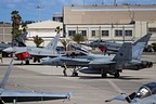 EF-18BM two-seater surrounded by Ala 14 Typhoons