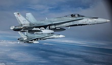 CF-188 Hornets equipped with AIM-9 Sidewinder missiles