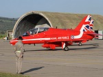 RAF Red Arrows passing one of Tanagra's shelters