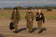 Satisfied pilots joined by the exercise chief Col. Frare (right)